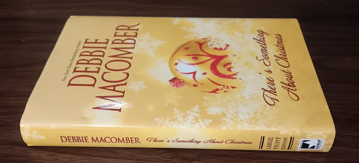 There’s Something About Christmas by Debbie Macomber — Large Print Hardcover