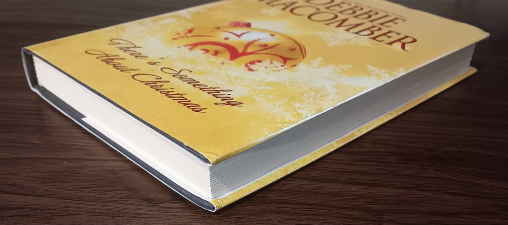 There’s Something About Christmas by Debbie Macomber — Large Print Hardcover